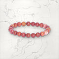 Bracelet pierres rondes Rhodochrosite du Brésil