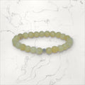 Bracelet pierres rondes Calcite jaune