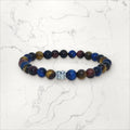 Bracelet pierres rondes 3 Oeil de Tigre  6 mm