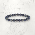 Bracelet pierres rondes Obsidienne dorée