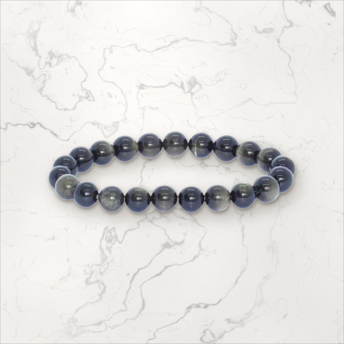 Bracelet pierres rondes Obsidienne dorée